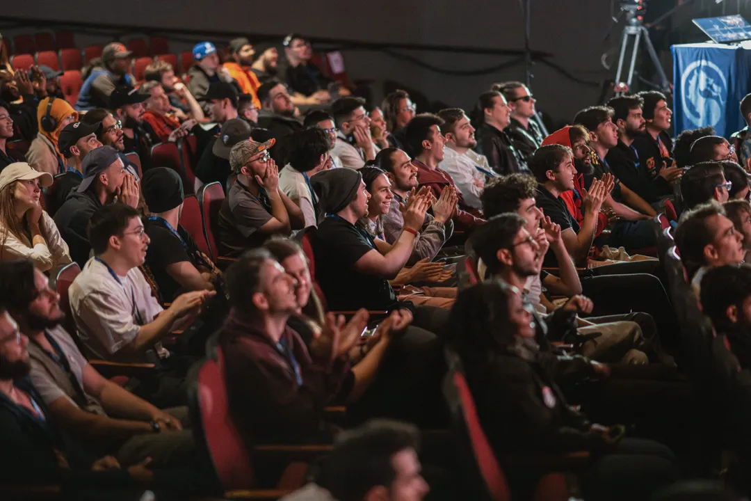 An esports crowd reacting in the Chrysalis seats during the Final Kombat tournament